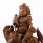 A solemn alloy copper inlaid silver statue of the God of Wealth riding a lion