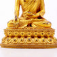 A majestic gilt bronze statue of Sakyamuni