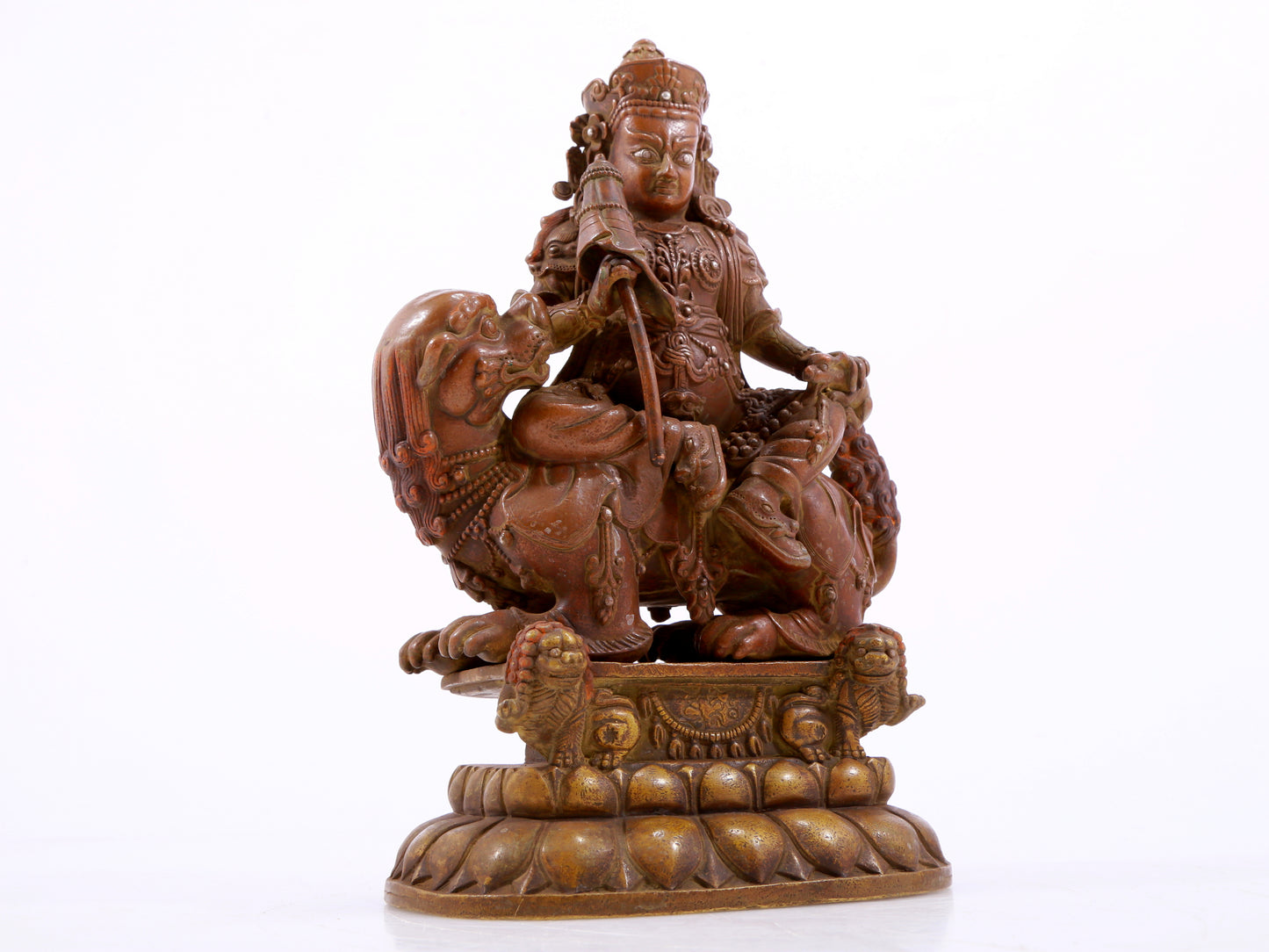 A solemn alloy copper inlaid silver statue of the God of Wealth riding a lion