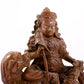 A solemn alloy copper inlaid silver statue of the God of Wealth riding a lion