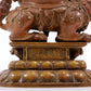 A solemn alloy copper inlaid silver statue of the God of Wealth riding a lion