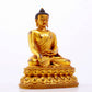 A majestic gilt bronze statue of Sakyamuni