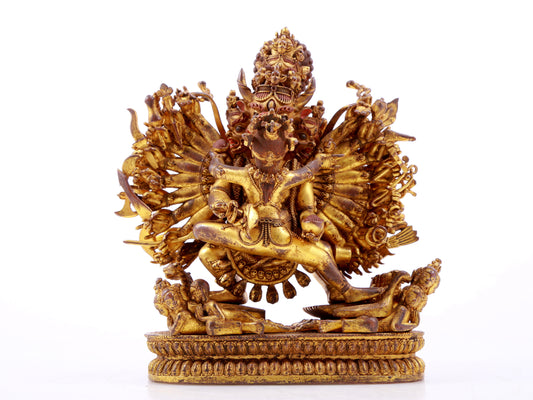 A solemn gilt bronze statue of Yamantaka Vajra