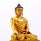 A majestic gilt bronze statue of Sakyamuni