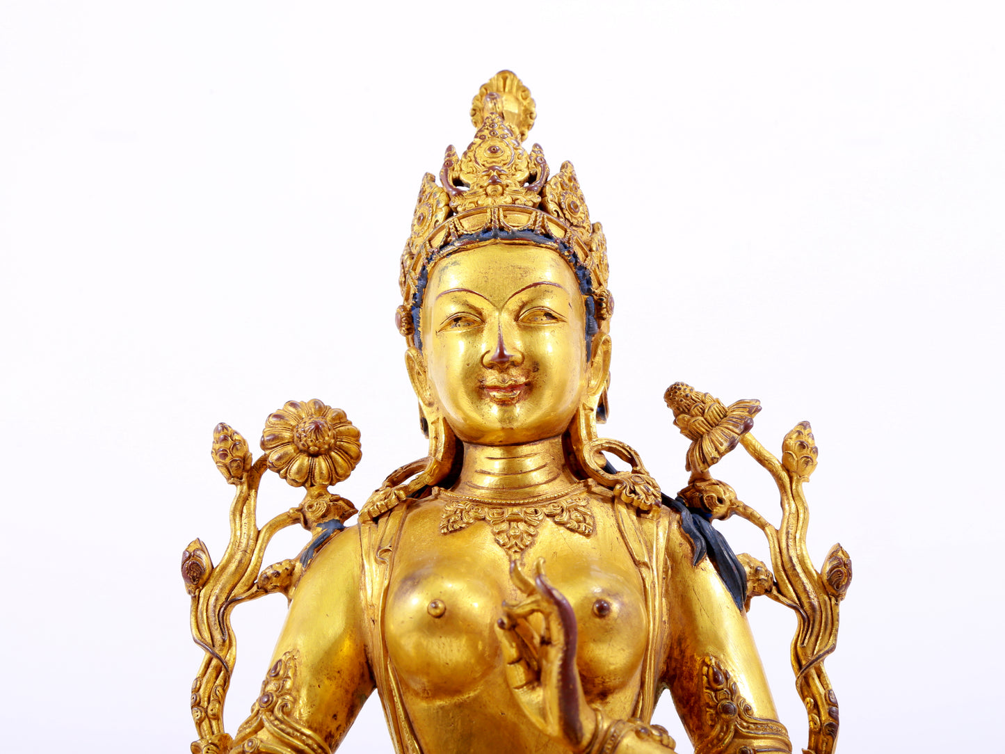 A majestic gilt bronze statue of green Tara