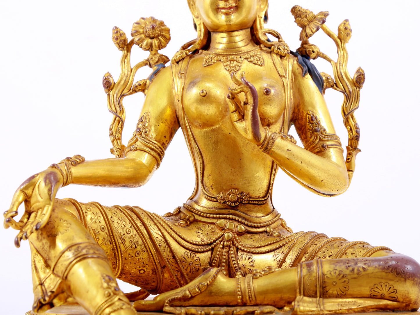 A majestic gilt bronze statue of green Tara