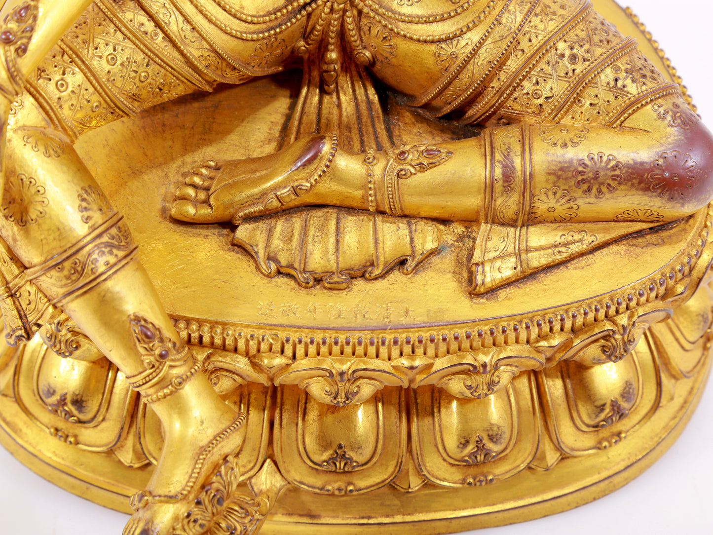 A majestic gilt bronze statue of green Tara