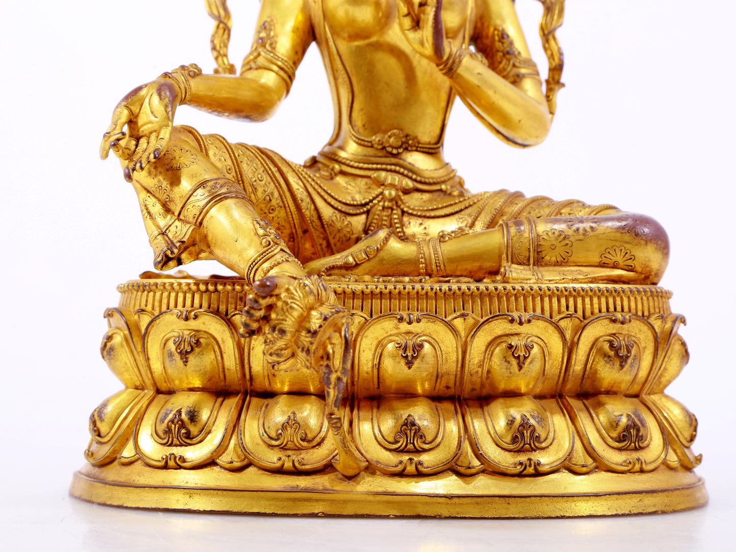 A majestic gilt bronze statue of green Tara