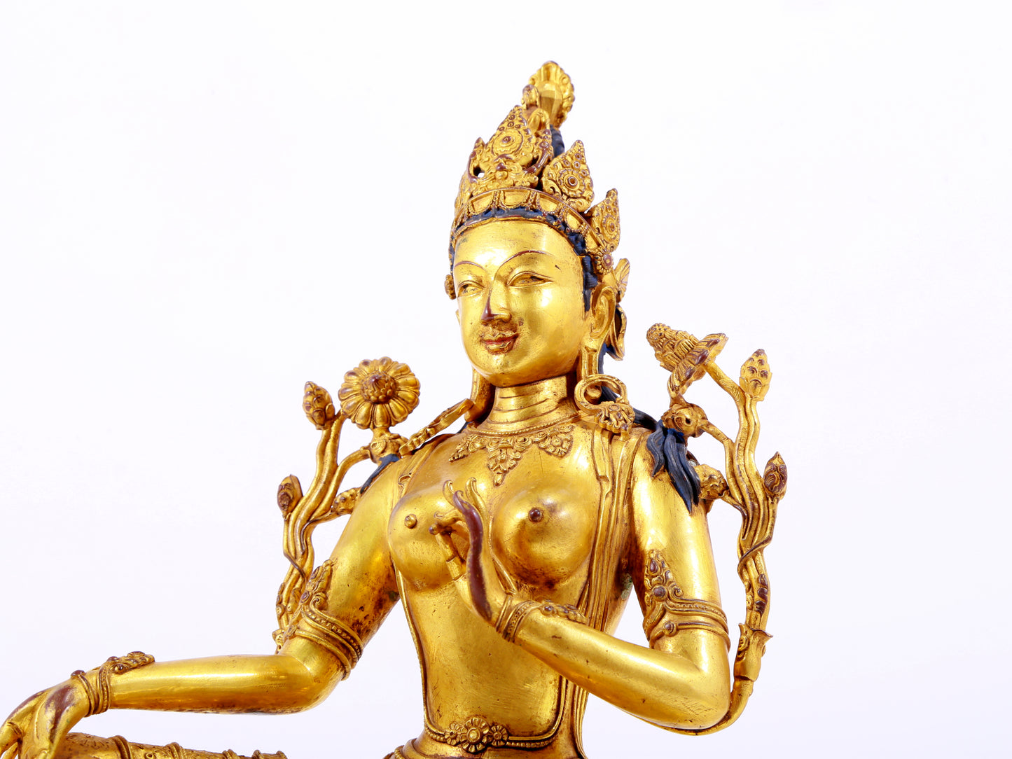 A majestic gilt bronze statue of green Tara