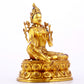 A majestic gilt bronze statue of green Tara