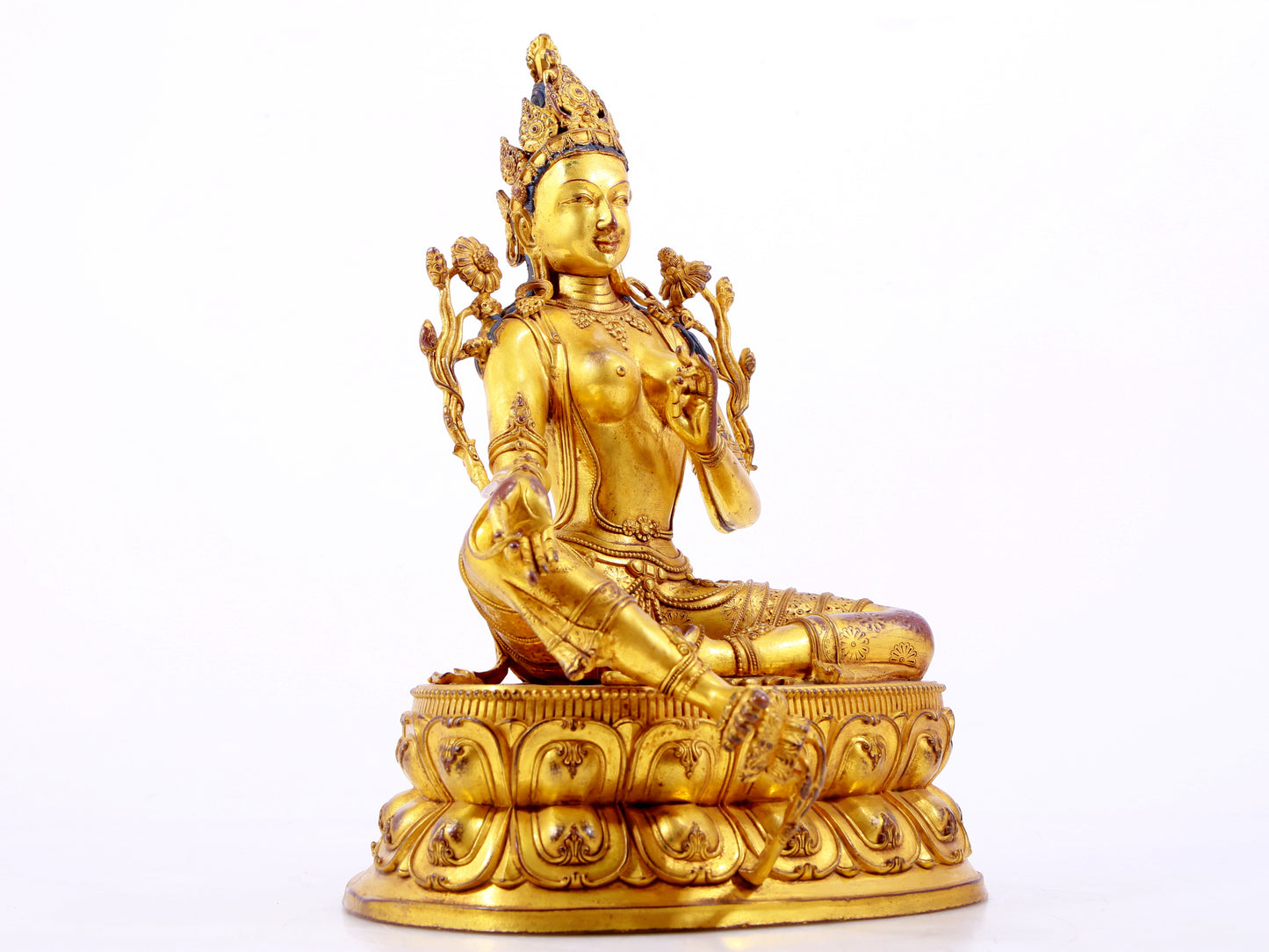 A majestic gilt bronze statue of green Tara