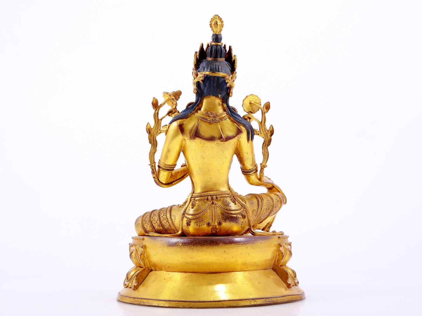 A majestic gilt bronze statue of green Tara