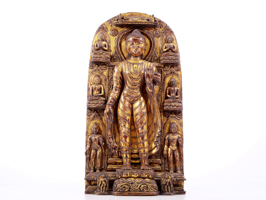 A majestic gilt bronze statue of Sakyamuni