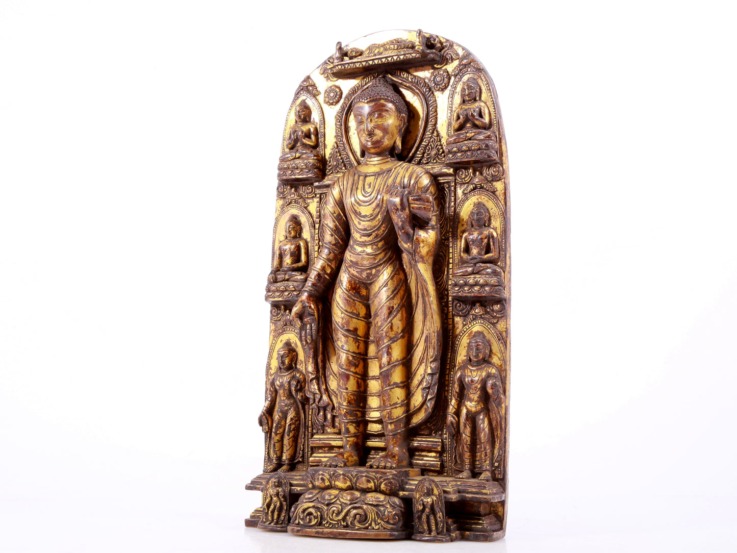 A majestic gilt bronze statue of Sakyamuni