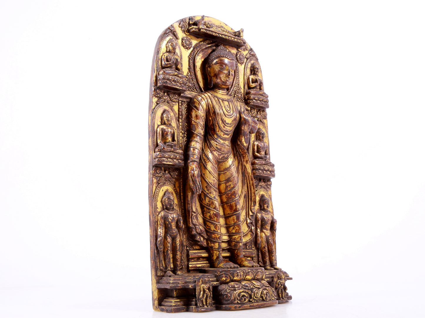 A majestic gilt bronze statue of Sakyamuni