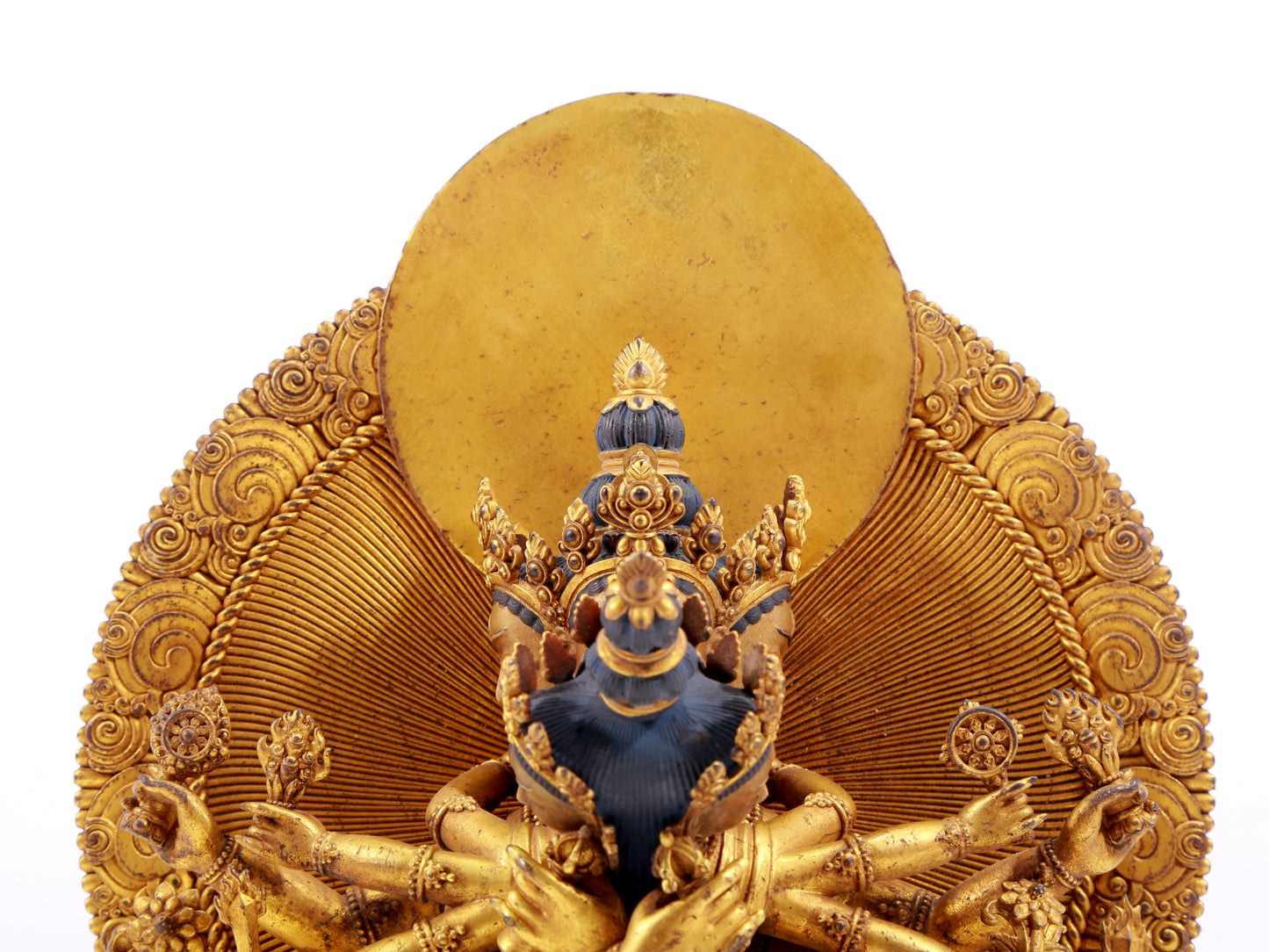 A majestic gilt bronze statue of the Buddha