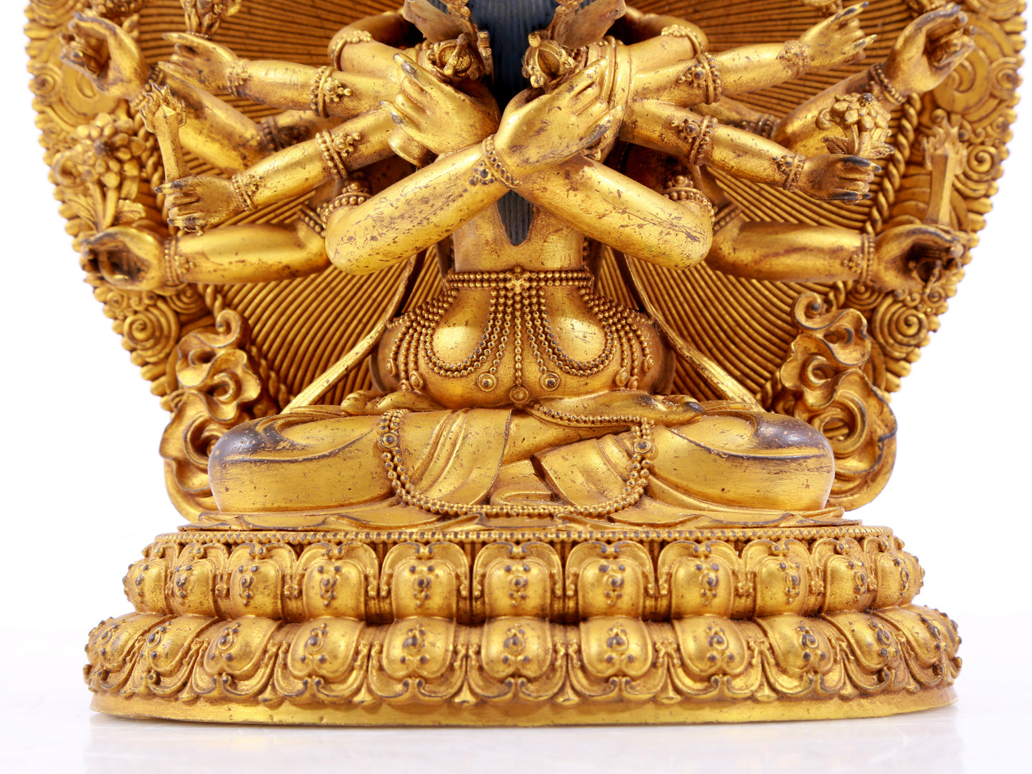 A majestic gilt bronze statue of the Buddha