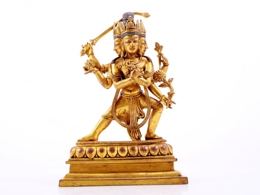 A solemn gilt bronze Vajra statue