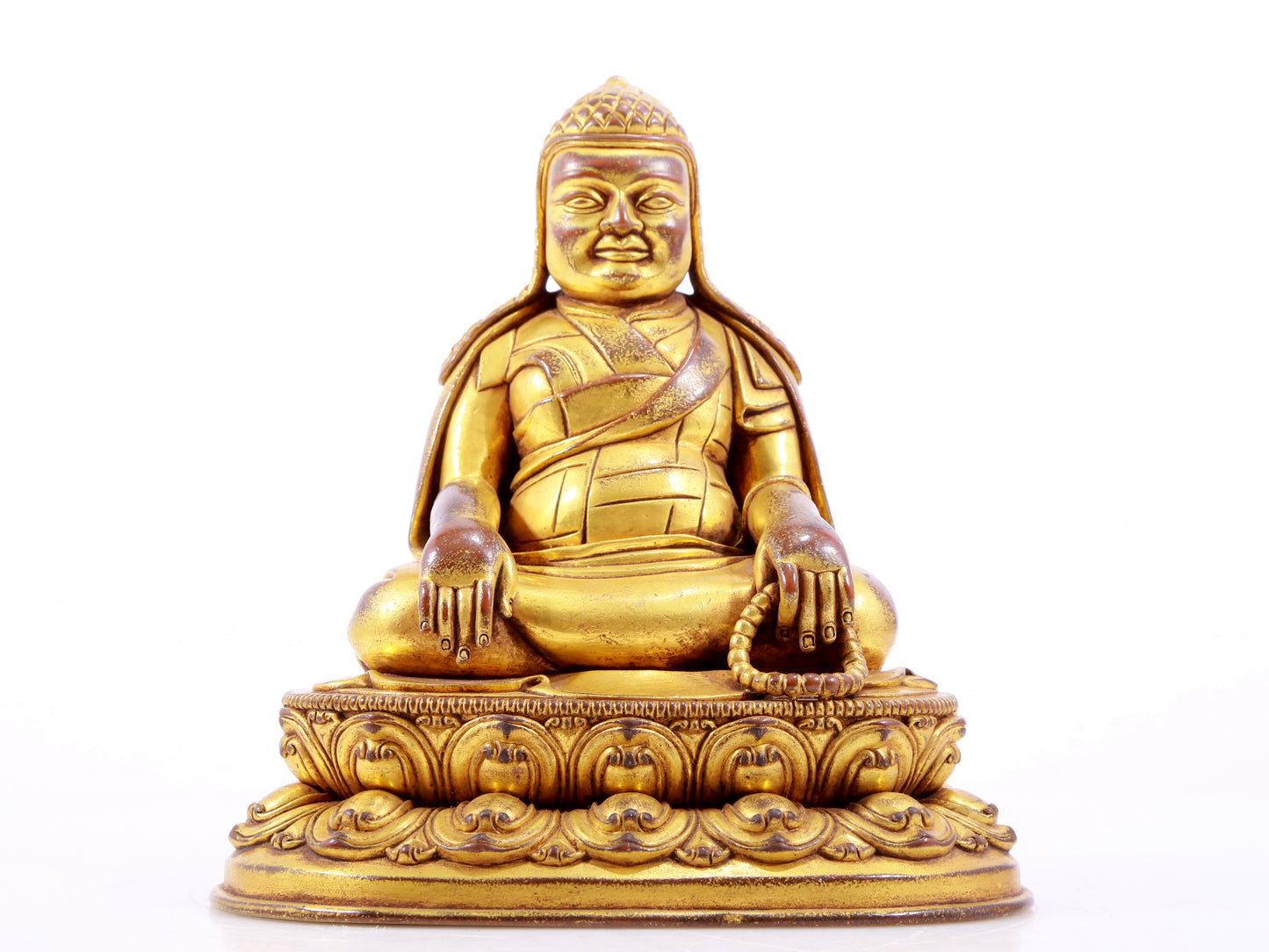 A majestic gilt bronze statue of Tsongkhapa