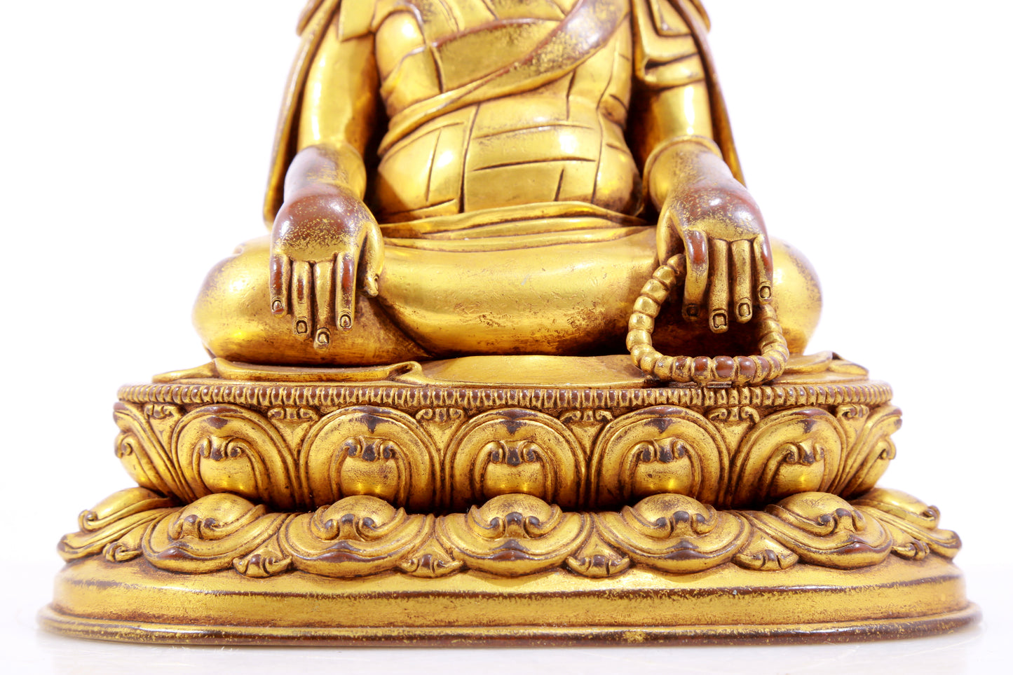 A majestic gilt bronze statue of Tsongkhapa