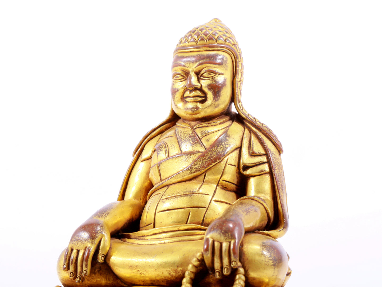 A majestic gilt bronze statue of Tsongkhapa