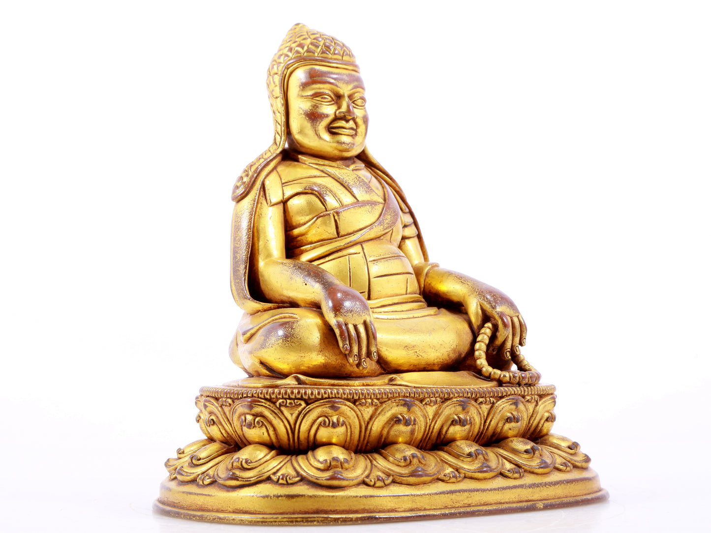 A majestic gilt bronze statue of Tsongkhapa