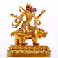 A majestic gilt bronze statue of the auspicious beast