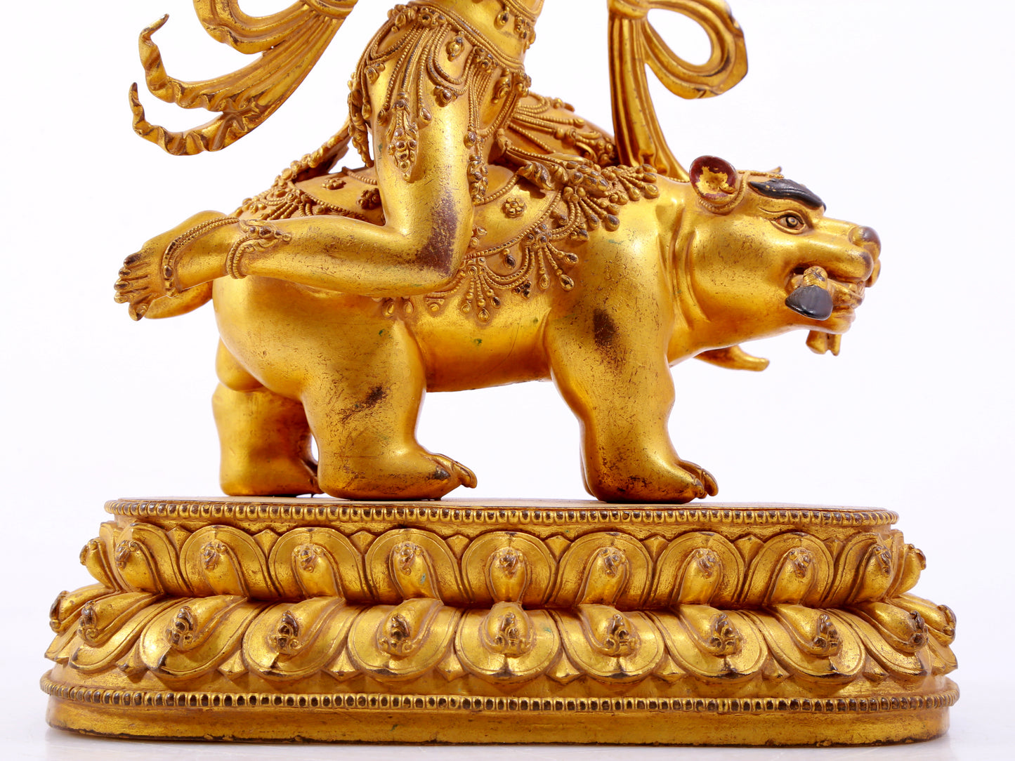 A majestic gilt bronze statue of the auspicious beast