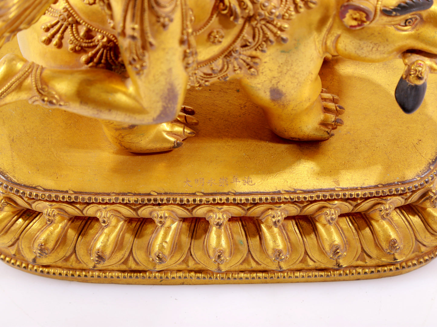 A majestic gilt bronze statue of the auspicious beast