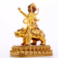 A majestic gilt bronze statue of the auspicious beast