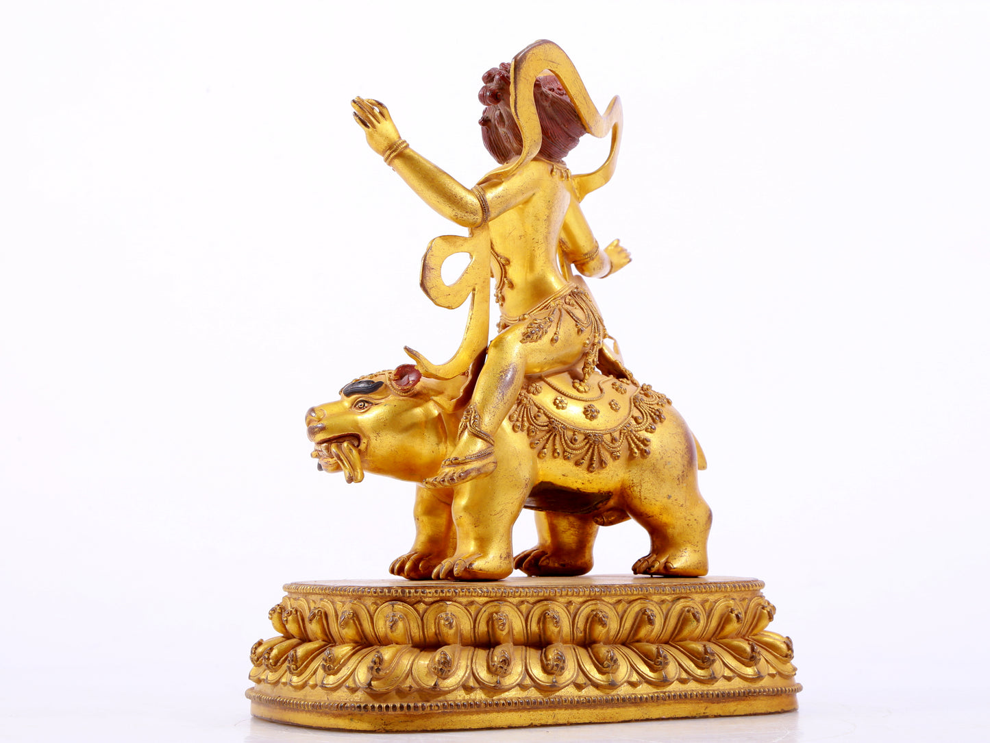 A majestic gilt bronze statue of the auspicious beast