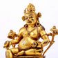 A solemn gilt bronze statue of the God of Wealth