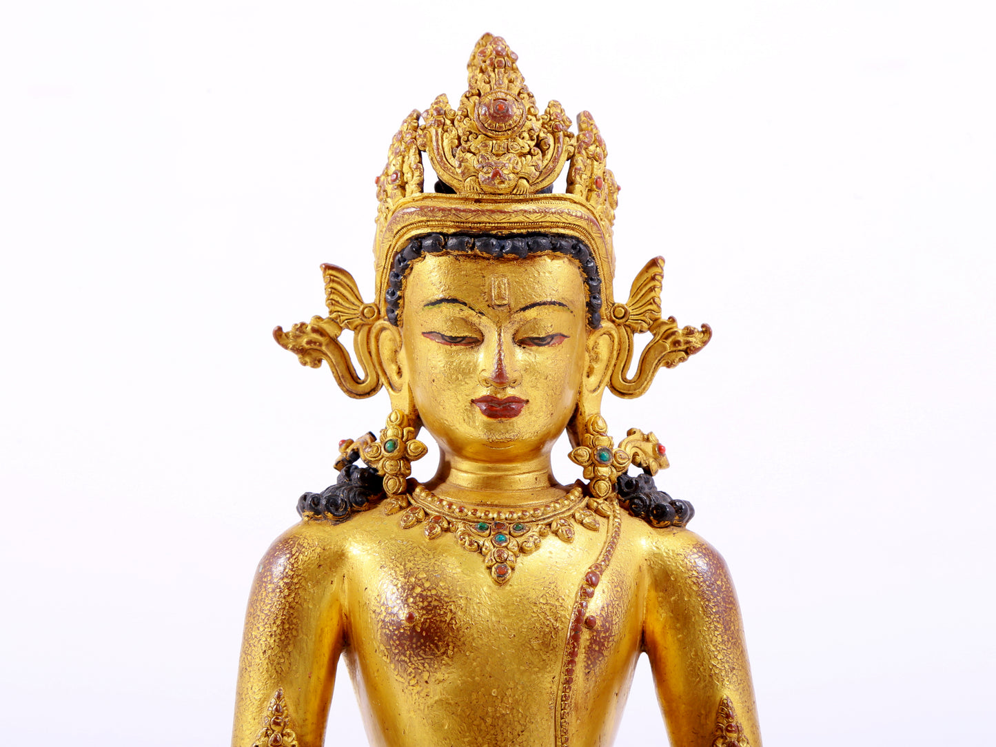 A majestic gilt bronze statue of Amitayus Buddha