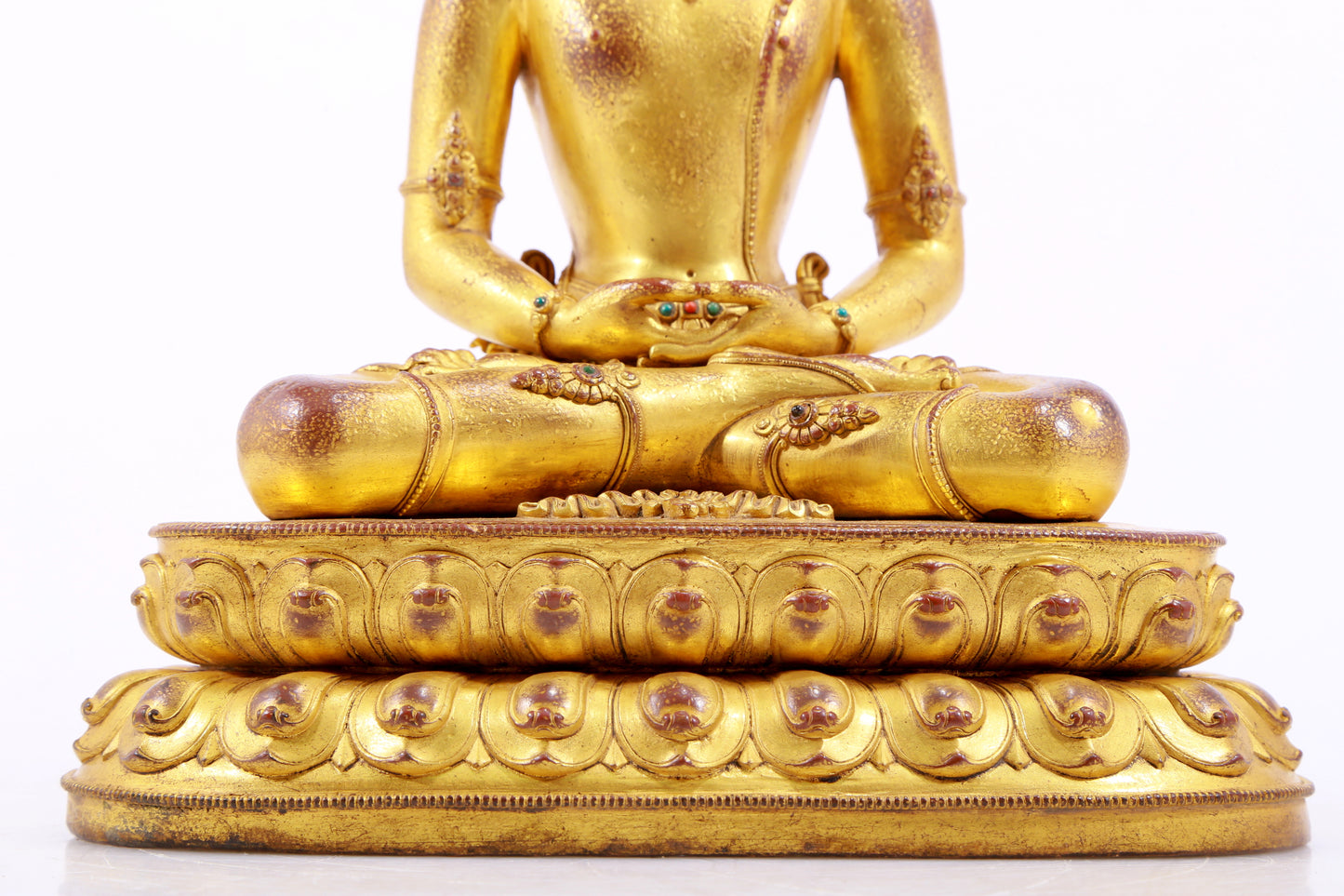 A majestic gilt bronze statue of Amitayus Buddha