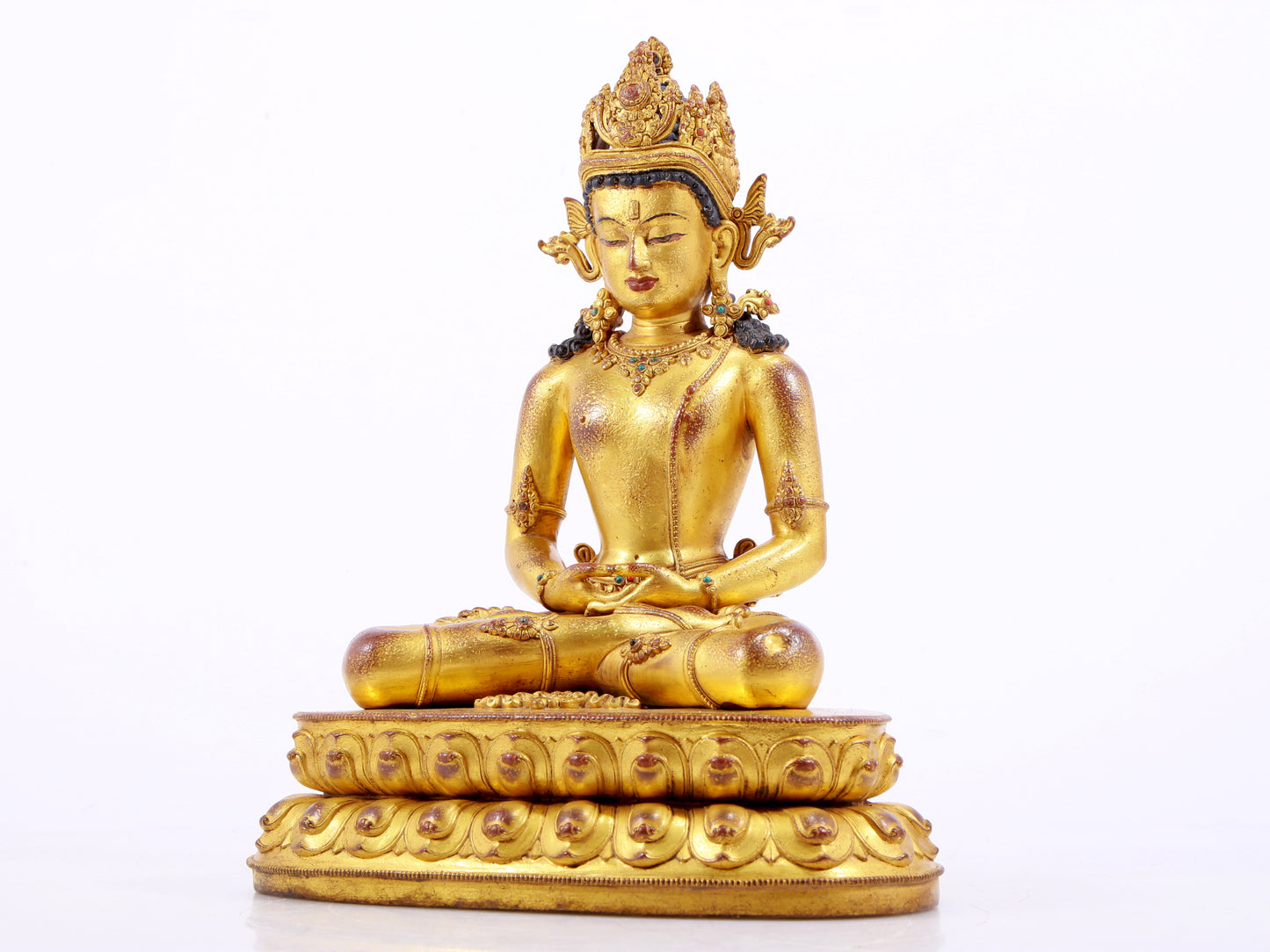 A majestic gilt bronze statue of Amitayus Buddha