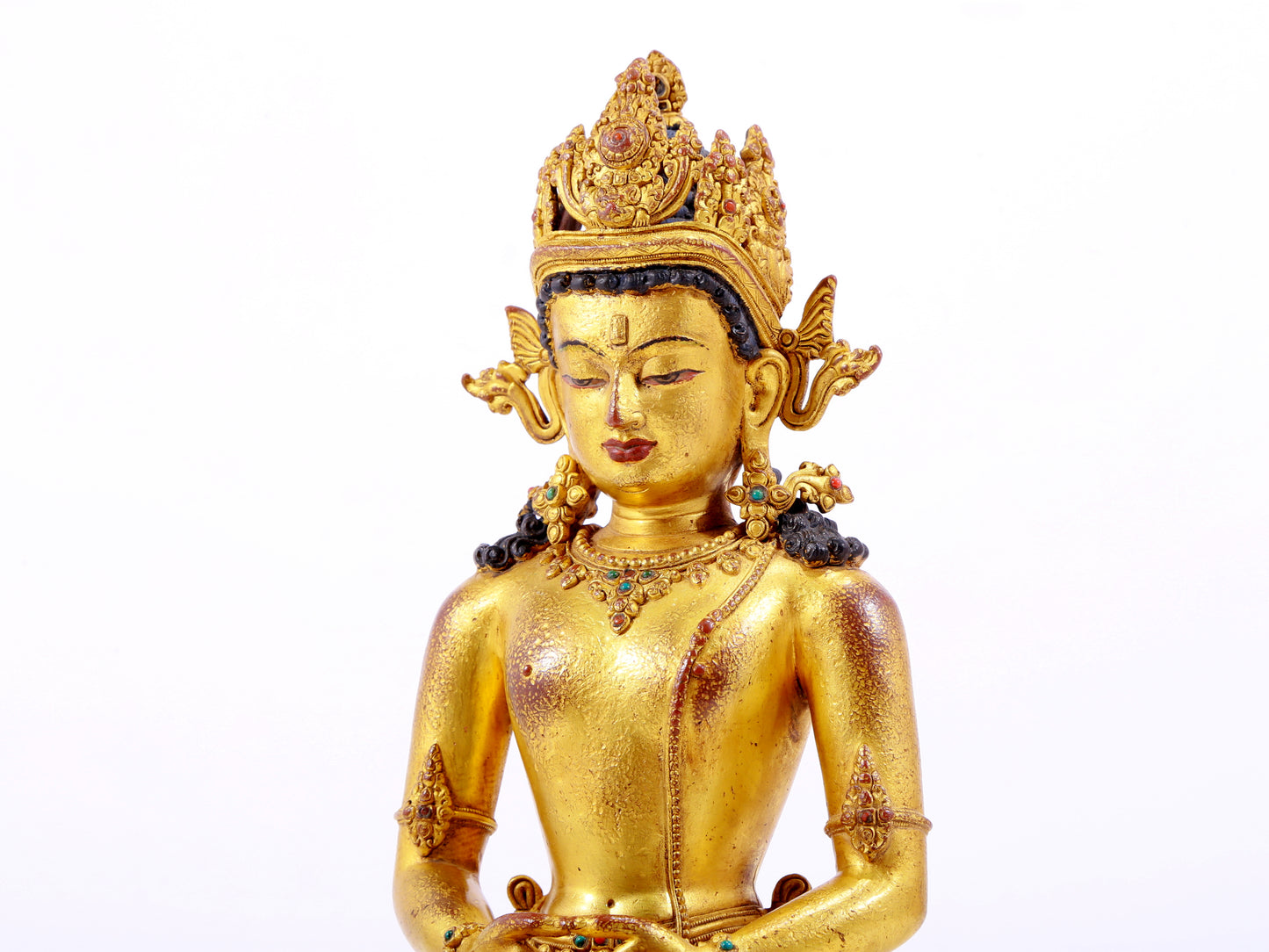 A majestic gilt bronze statue of Amitayus Buddha