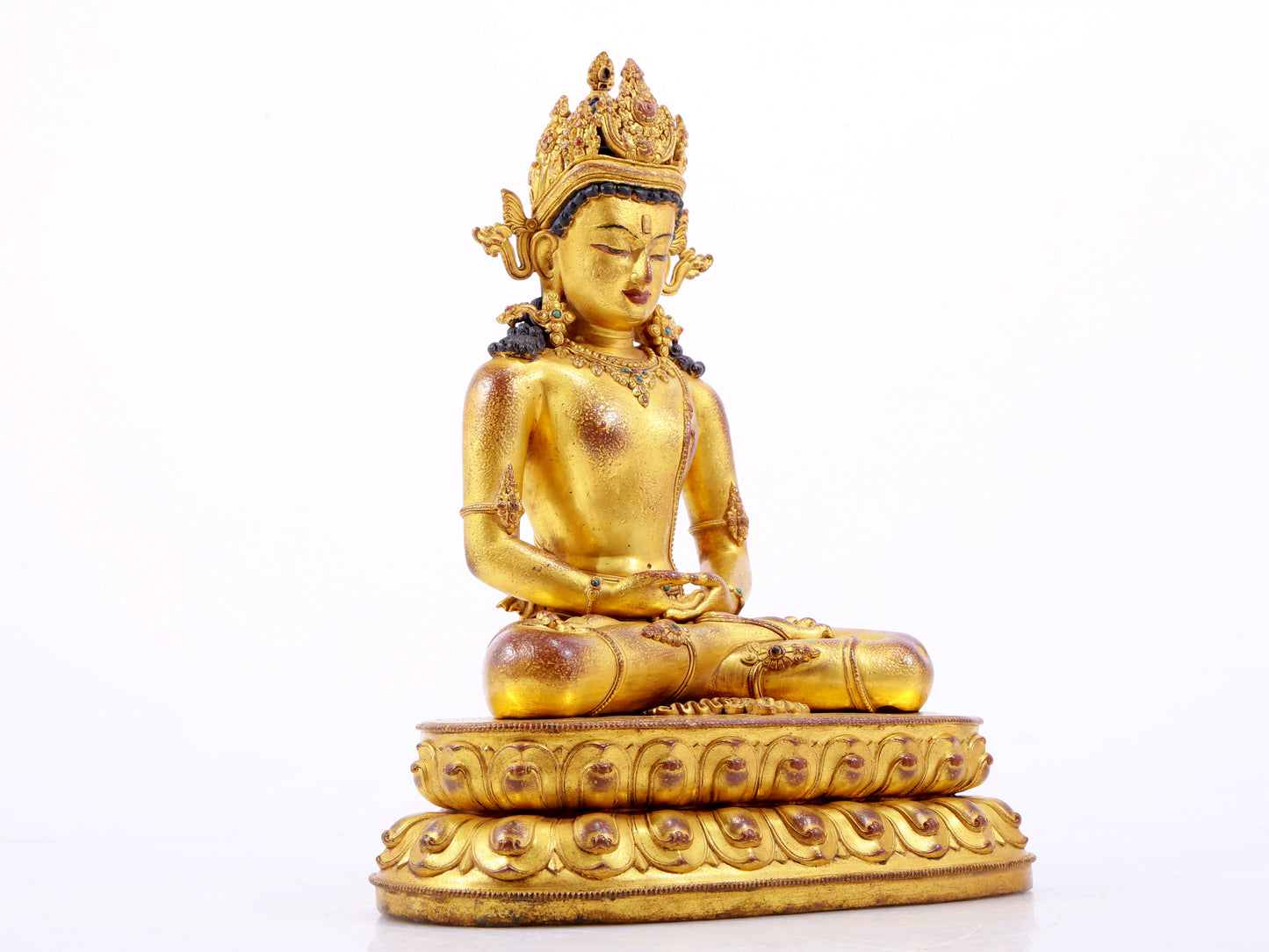 A majestic gilt bronze statue of Amitayus Buddha