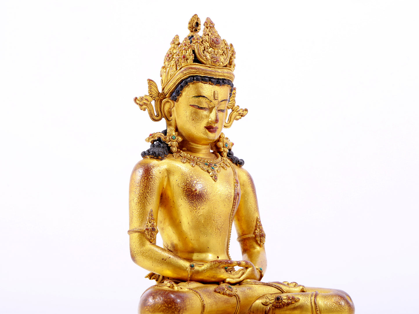 A majestic gilt bronze statue of Amitayus Buddha