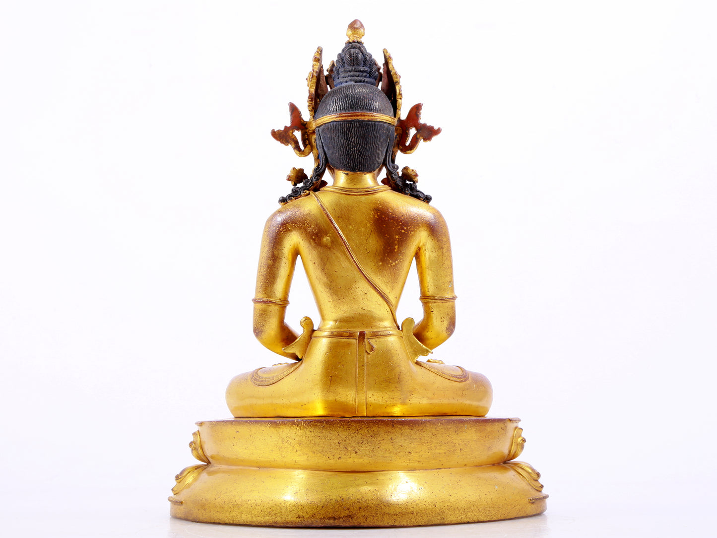 A majestic gilt bronze statue of Amitayus Buddha