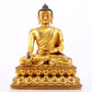 A majestic gilt bronze statue of Sakyamuni