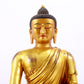 A majestic gilt bronze statue of Sakyamuni