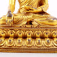 A majestic gilt bronze statue of Sakyamuni