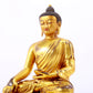 A majestic gilt bronze statue of Sakyamuni