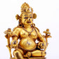 A solemn gilt bronze statue of the God of Wealth