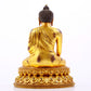 A majestic gilt bronze statue of Sakyamuni