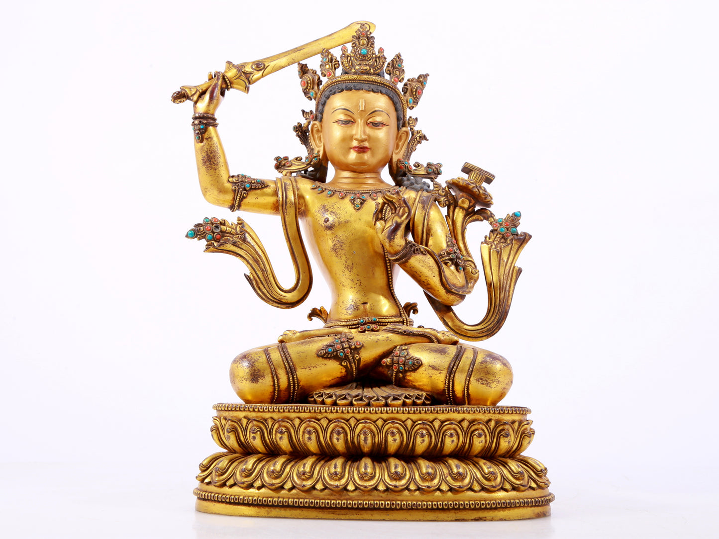 A solemn gilt bronze statue of Manjushri Bodhisattva inlaid with hundreds of treasures