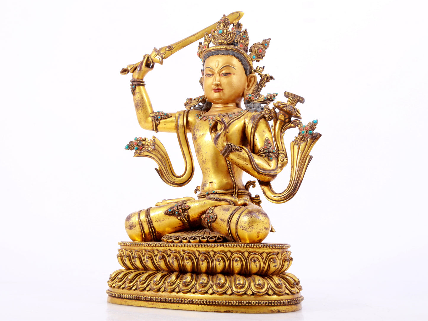 A solemn gilt bronze statue of Manjushri Bodhisattva inlaid with hundreds of treasures