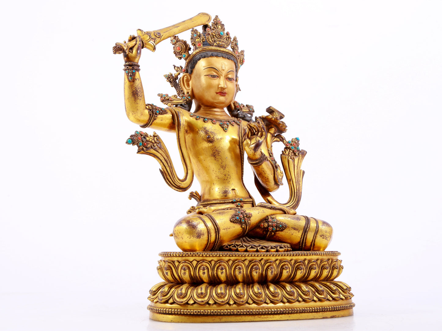 A solemn gilt bronze statue of Manjushri Bodhisattva inlaid with hundreds of treasures