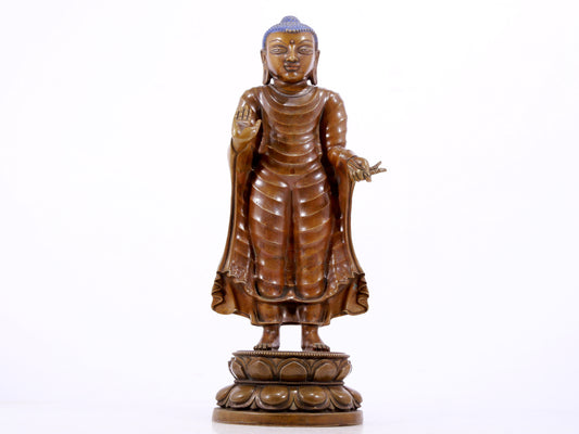 A solemn alloy copper statue of Gautama Buddha