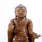 A solemn alloy copper statue of Gautama Buddha